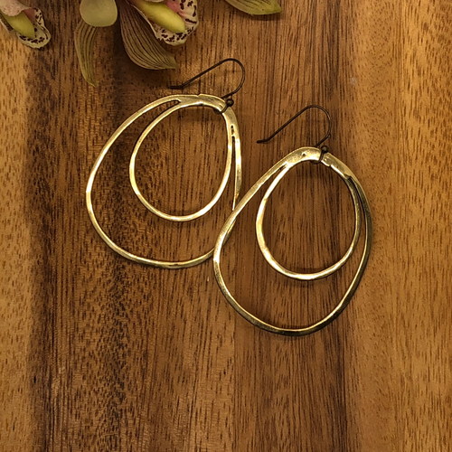 hammered brass double hoop brass earrings.